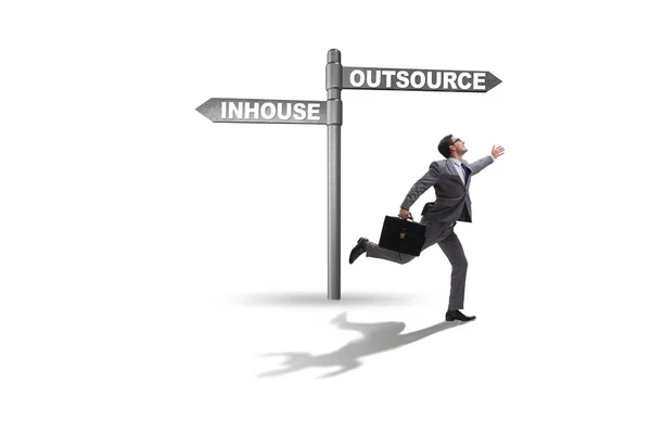 Empresario decidiendo entre outsourcing e inhouse — Foto de Stock