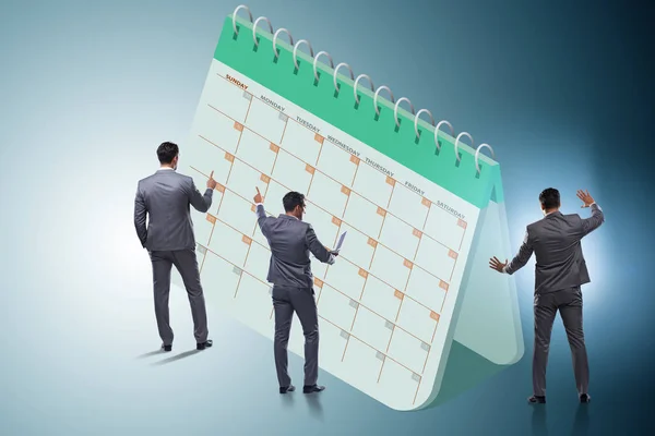 Business calendar concept with businessman