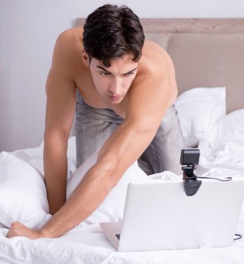Young sexy man in online dating concept clipart
