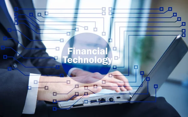 Hands working on laptop in financial technology fintech concept — Stock Photo, Image