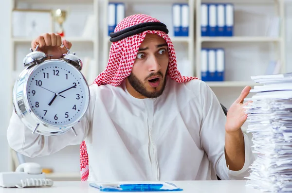 Arab businessman working in the office doing paperwork with a pi — Stock Photo, Image