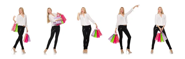 Mulher muitos sacos de compras depois de fazer compras isolado no branco — Fotografia de Stock
