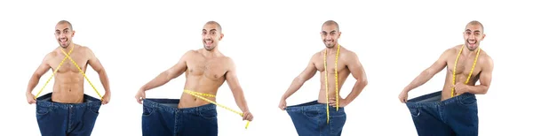 节食概念与超大牛仔裤的男人 — 图库照片