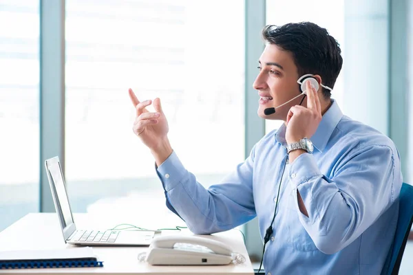 Male call-center operator in business concept — Stock Photo, Image