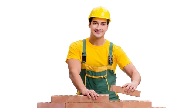 The handsome construction worker building brick wall — Stock Photo, Image