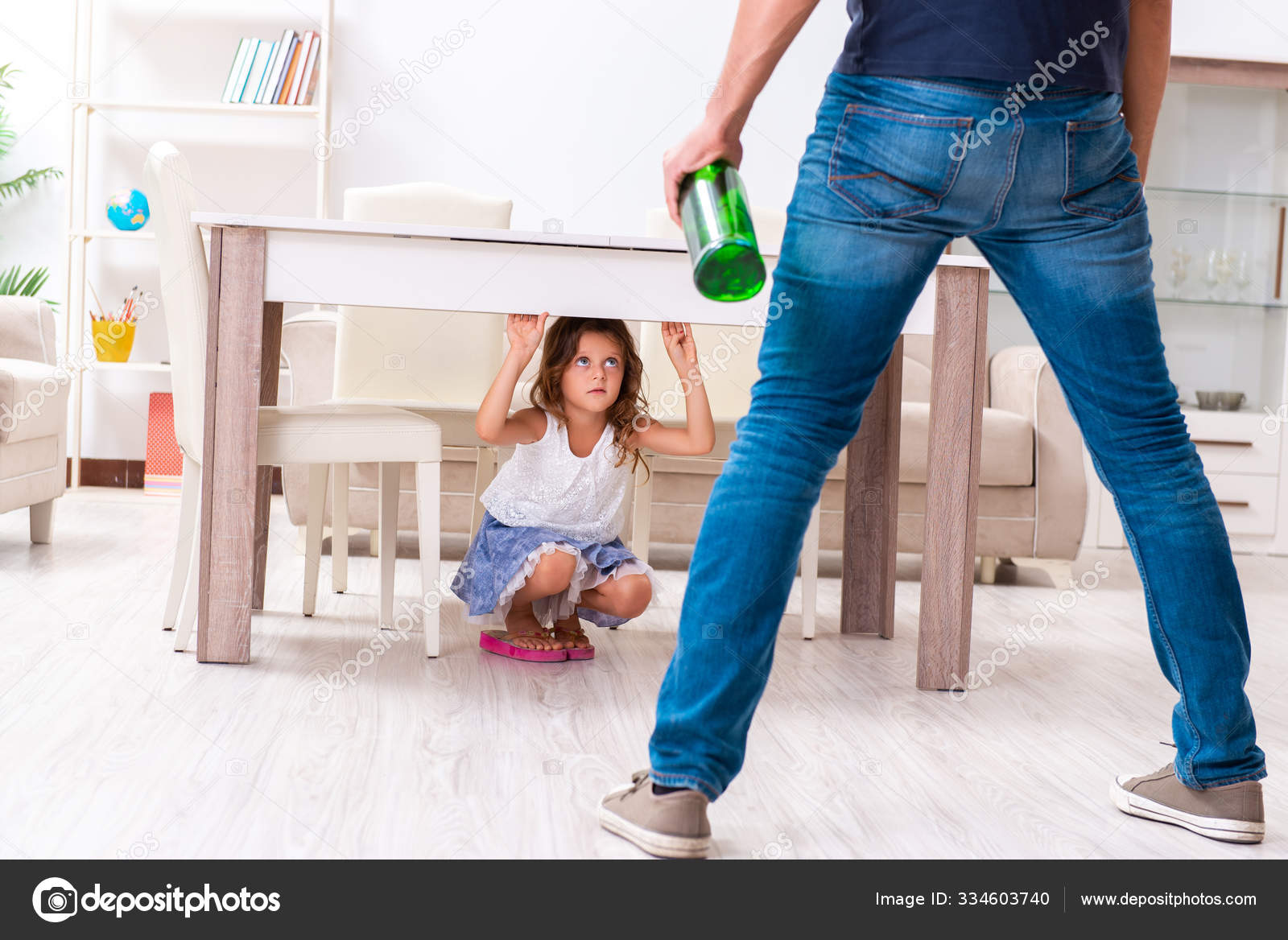 Drunk father in domestic child abuse and violence concept Stock Photo