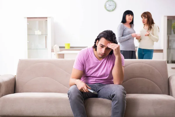 Young family and mother-in-law in family issues concept — Stock Photo, Image