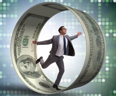 Hamster çarklı bir iş adamı dolarları kovalıyor.