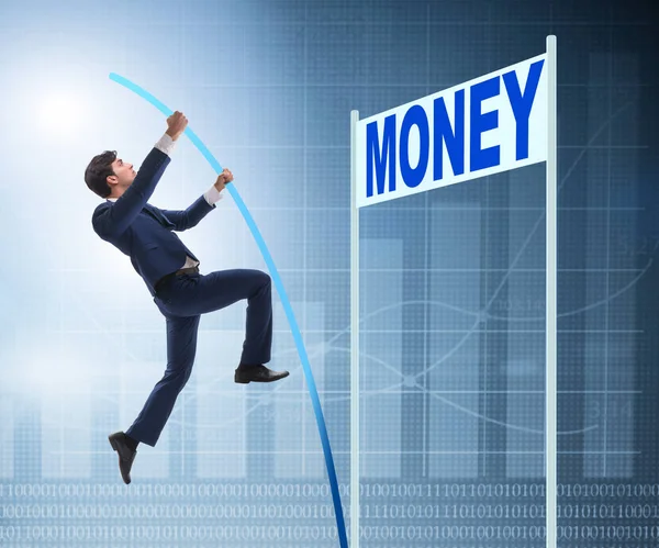 Zakenman springen over geld in business concept — Stockfoto