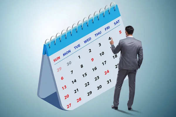 Conceito de calendário de negócios com empresário — Fotografia de Stock