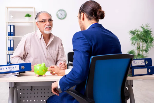 Financial advisor giving retirement advice to old man