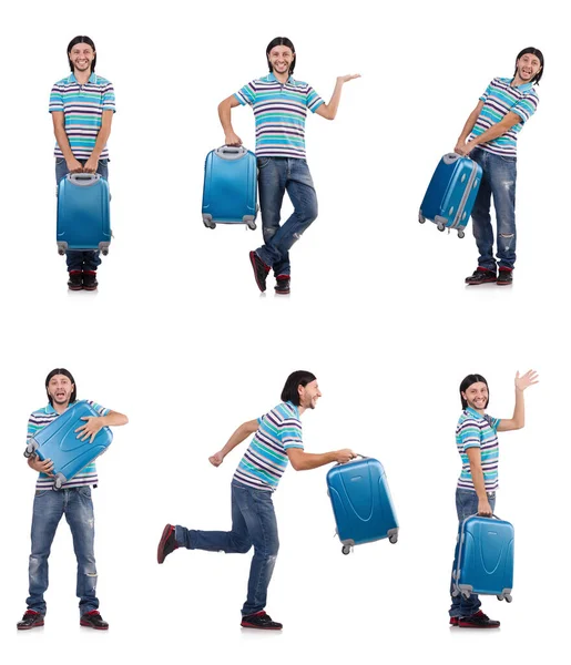 A fiatalember fehér bőröndökkel utazik. — Stock Fotó