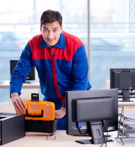 Computer repairman specialist repairing computer desktop