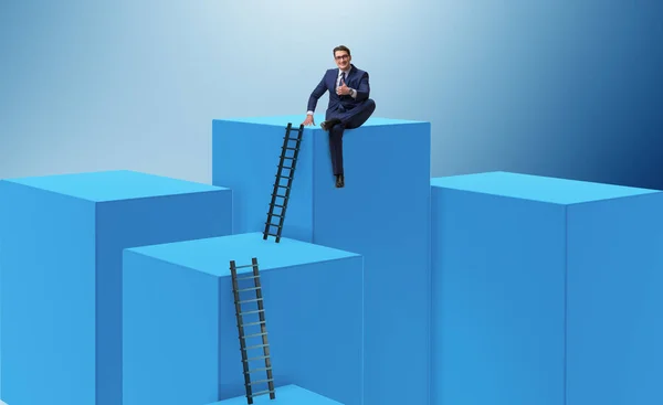 Businessman climbing blocks in career ladder business concept — Stock Photo, Image