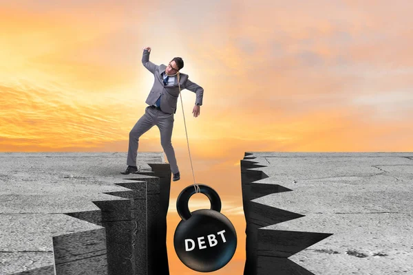 Koncepcja zadłużenia i obciążenia biznesmenem — Zdjęcie stockowe