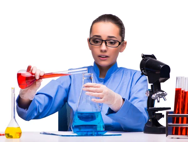 Young female doctor in lab isolated on white — Stock Photo, Image