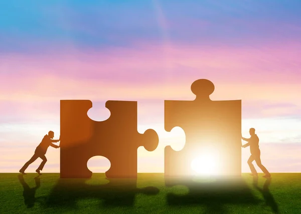 Zakelijke metafoor van teamwork met legpuzzel — Stockfoto