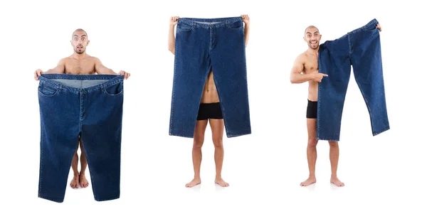 Uomo a dieta concetto con jeans oversize — Foto Stock