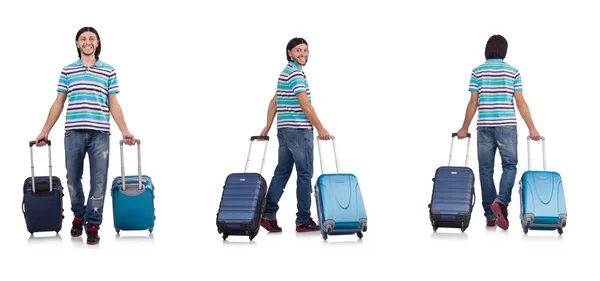 A fiatalember fehér bőröndökkel utazik. — Stock Fotó