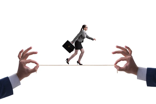 Businesswoman walking on tight rope — Stock Photo, Image