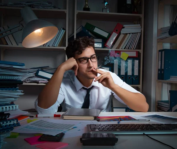 Man businessman working late hours in the office — Stock Photo, Image