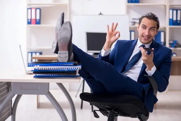 Young male businessman working in the office — Stock Photo, Image