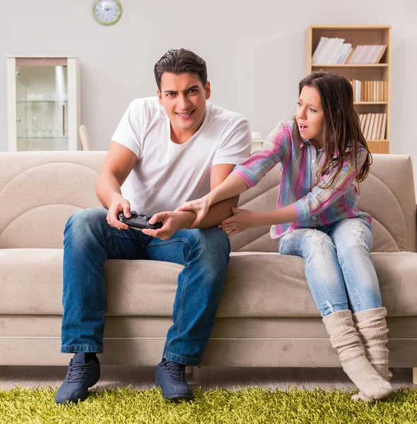 Young family suffering from computer games addiction — Stock Photo, Image