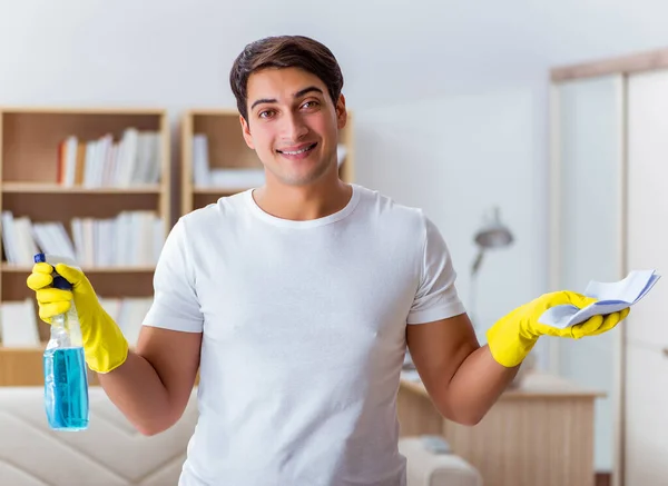 Man husband cleaning the house helping wife — Stock Photo, Image