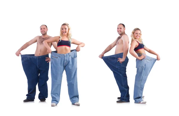 Mulher e homem perdendo peso isolado no branco — Fotografia de Stock