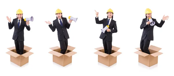 Man with hardhat and loudspeaker standing in the box — Stock Photo, Image