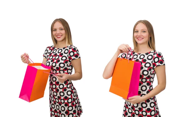 Jonge vrouw na het winkelen geïsoleerd op de witte — Stockfoto