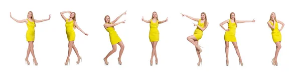 Hübsche große Frau im kurzen gelben Kleid auf weißem Grund — Stockfoto
