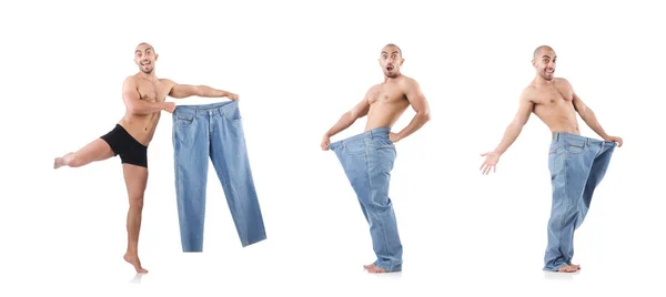 Mann im Diätkonzept mit übergroßen Jeans — Stockfoto