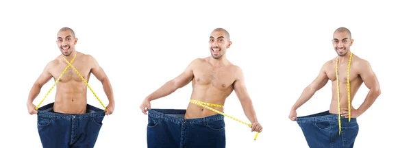 Hombre en concepto de dieta con jeans de gran tamaño — Foto de Stock