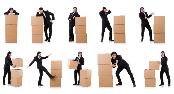 Uomo divertente con scatole su bianco — Foto Stock