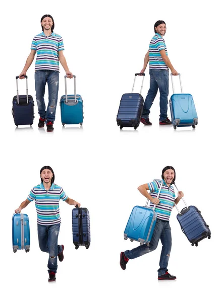 Молодой человек путешествует с чемоданами, изолированными на белом — стоковое фото