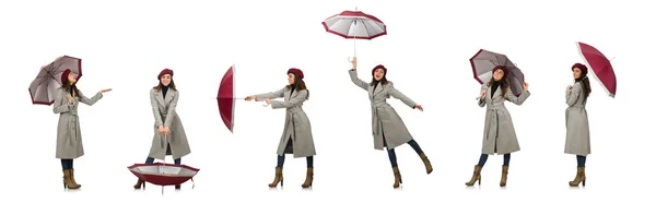 Жінка з парасолькою ізольована на білому — стокове фото