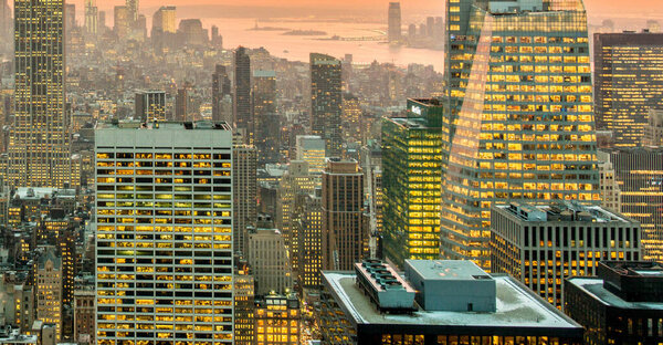 The view of new york manhattan during sunset hours