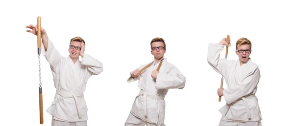 Divertido luchador de karate con nunchucks en blanco — Foto de Stock