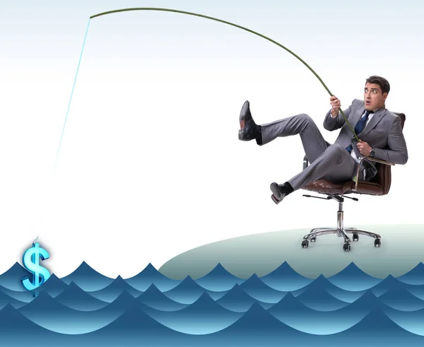 Az üzletember dollárokat halászik ki a vízből — Stock Fotó