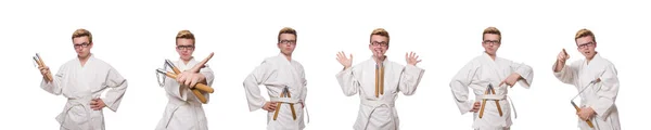 Vicces karate harcos nuncsakuval a fehér ruhán. — Stock Fotó