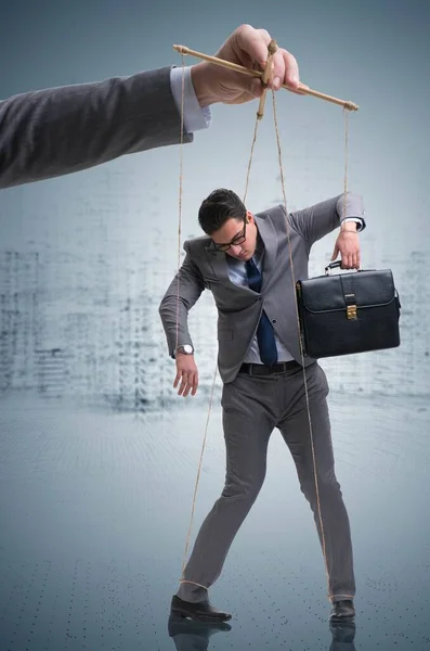 Businessman puppet being manipulated by boss — Stock Photo, Image