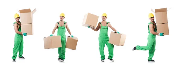 Hombre en mono verde con cajas — Foto de Stock