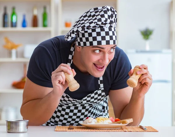 Chef cook cooking a meal breakfast dinner in the kitchen — Stock Image Chef cook cooking a meal breakfast dinner in the kitchen Stock Image