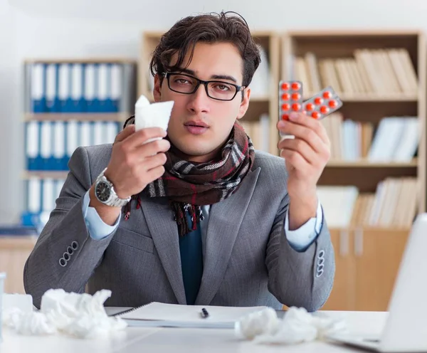 Sick businessman suffering from illness in the office — Stock Photo, Image