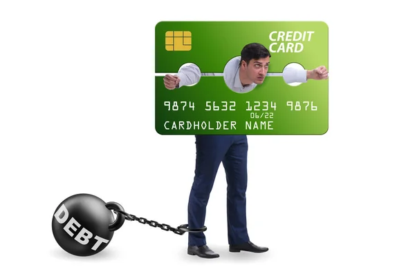 Homme d'affaires dans le concept de fardeau de carte de crédit dans pilori — Photo