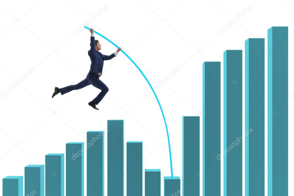 Businessman vault jumping over bar charts
