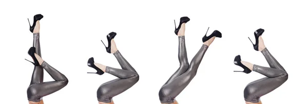 Женские ноги с чулками на белом — стоковое фото