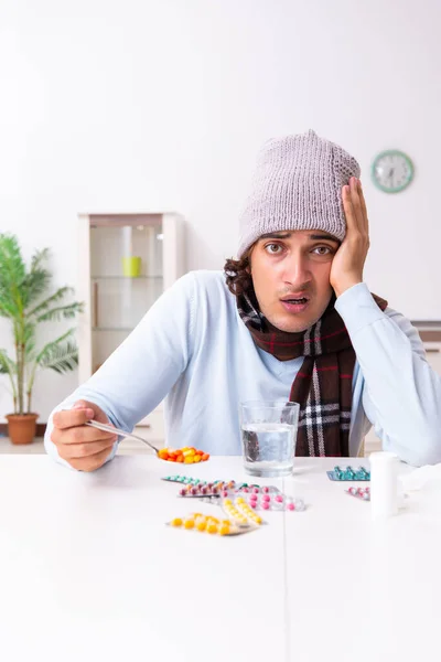Young man suffering from flu at home — Stock Photo, Image