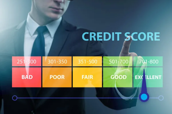 Businessman in credit score concept — Stock Photo, Image